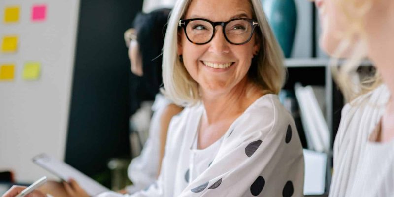 smiling lady in glasses